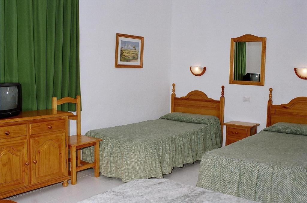 Alhambra Boutique Apartments Playa del Inglés Quarto foto